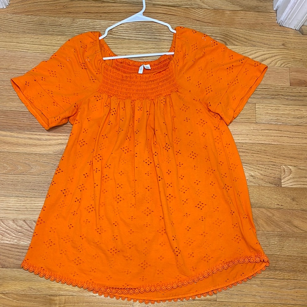 Orange short sleeve shirt